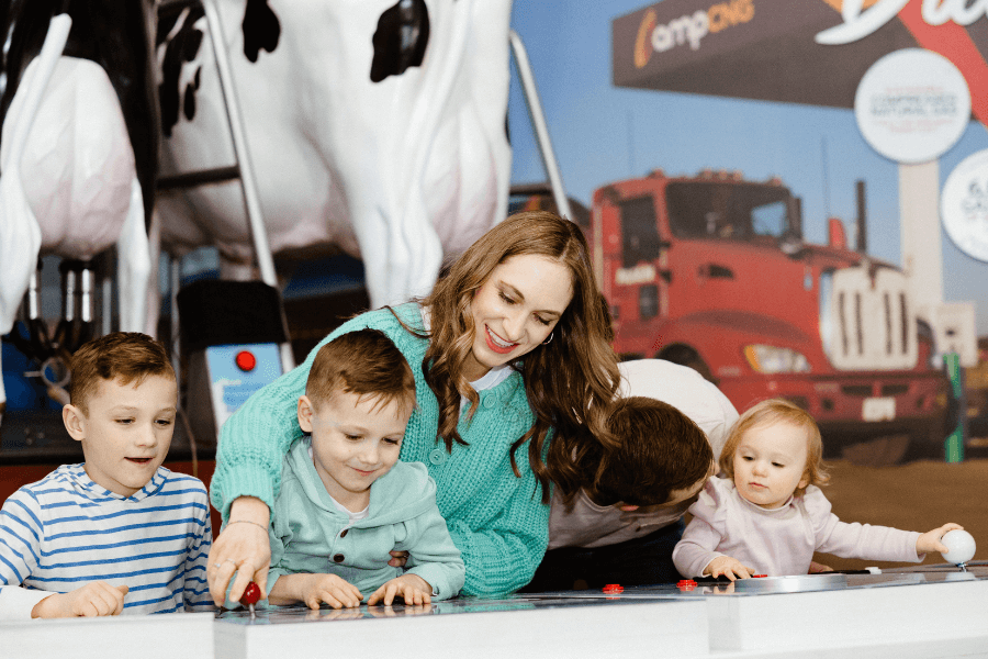 mother and children playing game